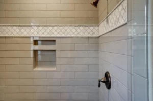 Bathroom tile wall | Cherry City Interiors and Design